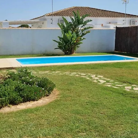 Casitas De La Barrosa Con Jardin Y Piscina Holiday home *